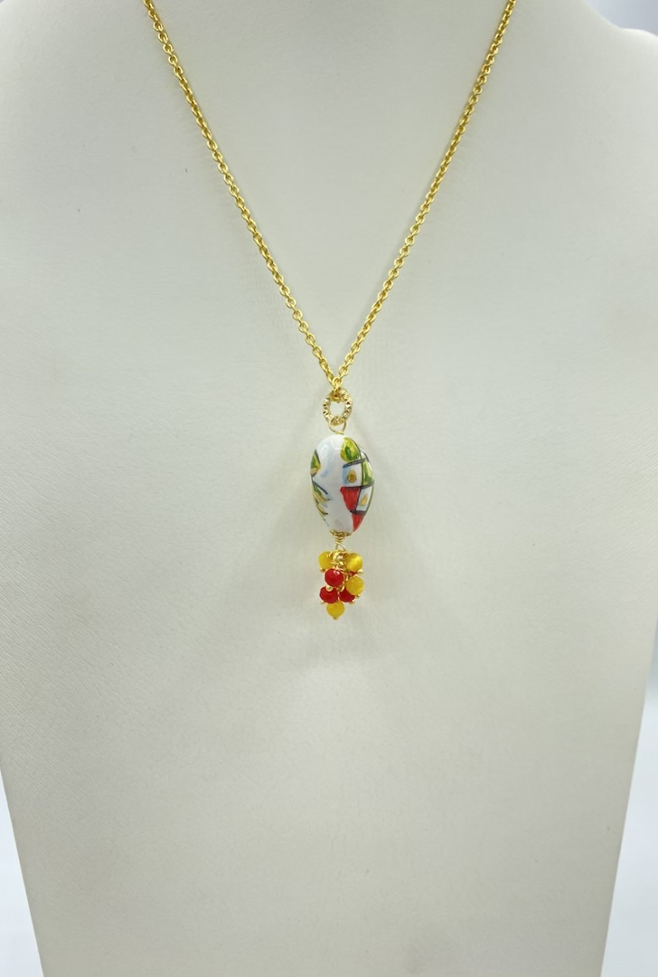 Collana in ottone con cuore con limoni e scacchiera dipinto a mano