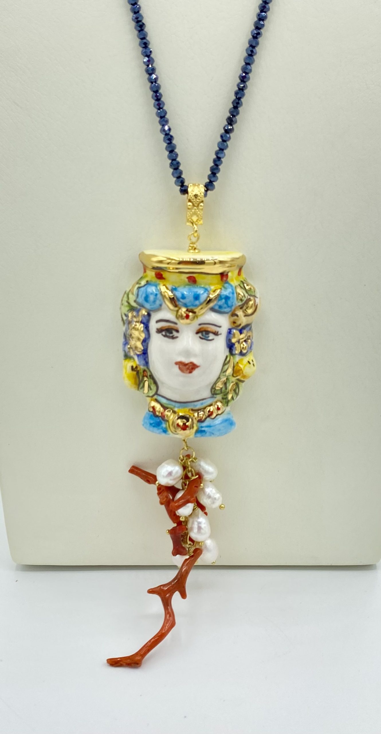 Collana in Swarovski blu con testa di moro donna in ceramica e lustro in oro